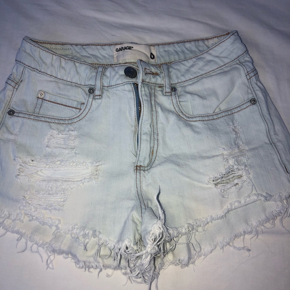 Garage light washed ripped jean shorts
